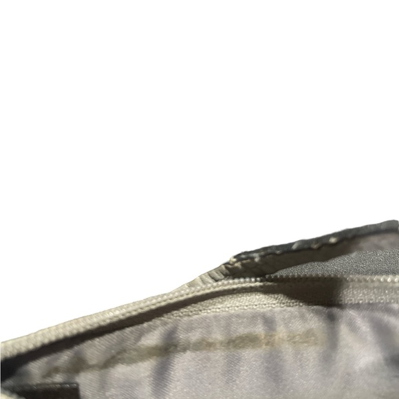 Grey cloth coach wristlet with leather accents and strap. Silver color. - Picture 11 of 11